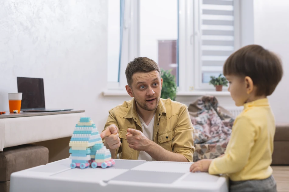 Small boy with dad play Future career happy child with father with stethoscope childhood parenting family doctor medicine and health father and son in medical uniform I want to play